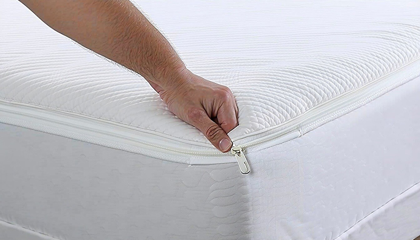 Mattress protector being zipped